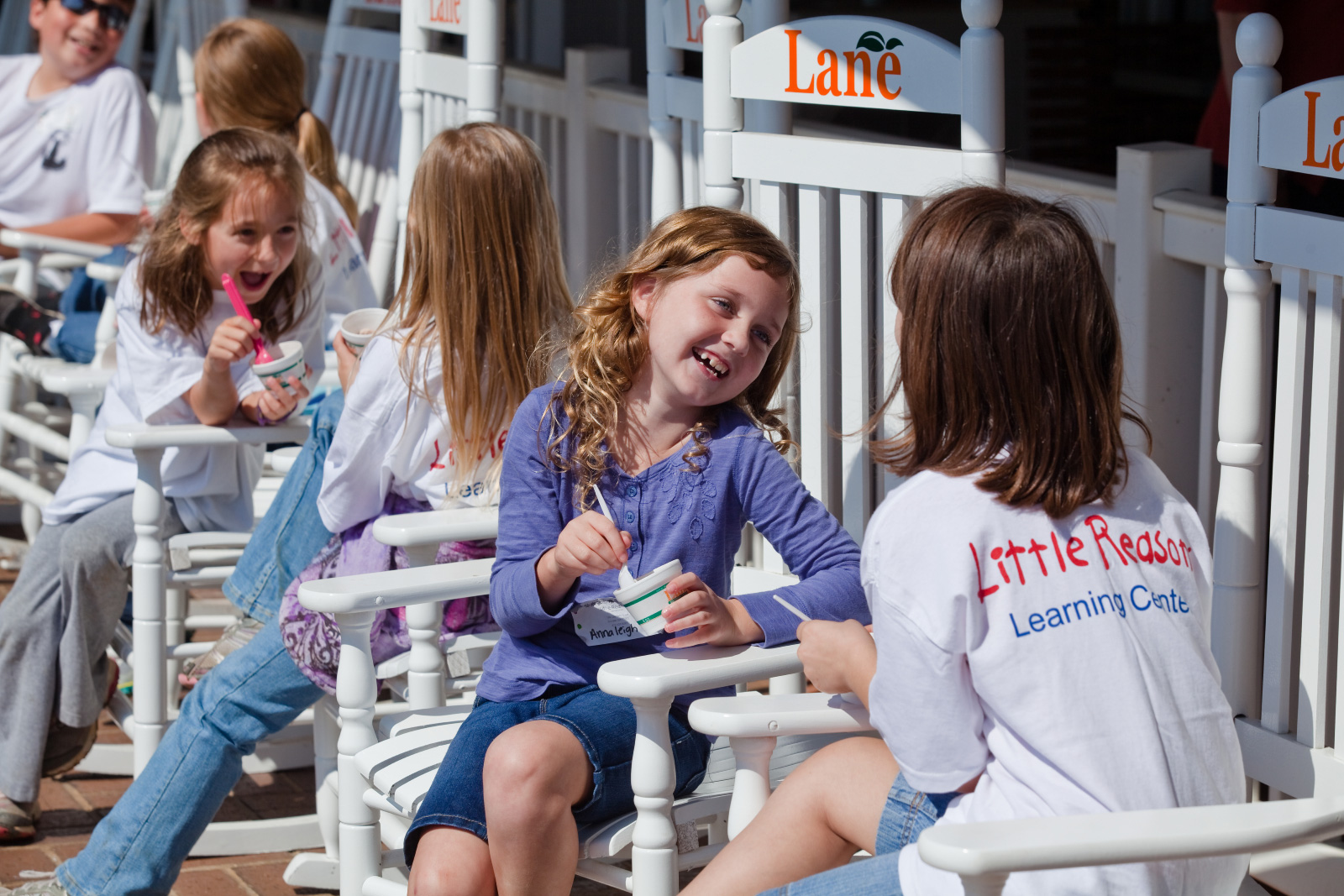 Children eating ice cream outside Lane Southern Orchards