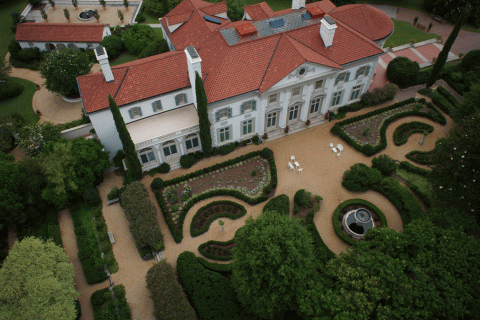 Aerial view of Hills & Dales Estate surrounded with lush greenery.