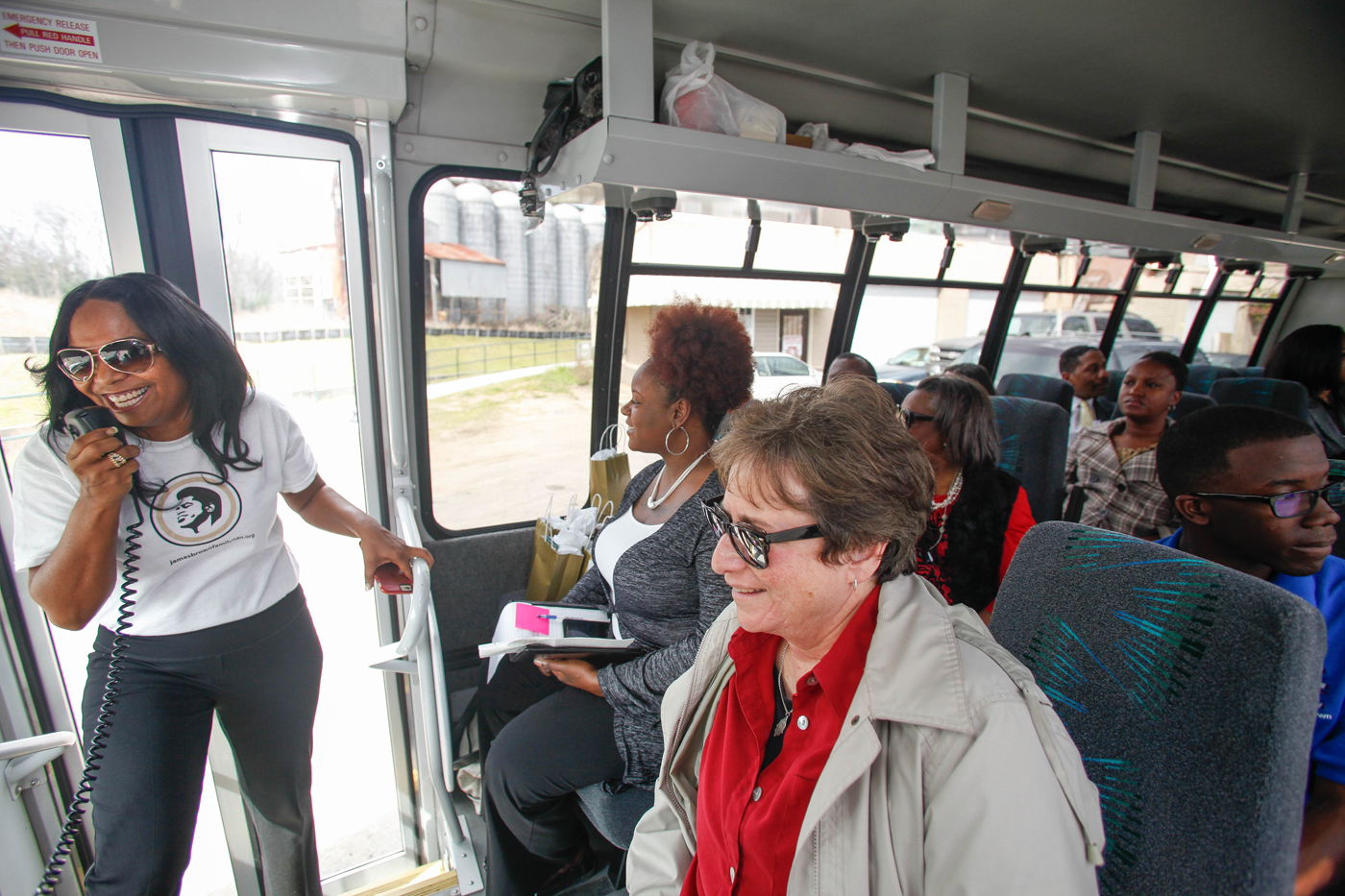 Deanna Brown-Thomas leads a bus tour of James Brown