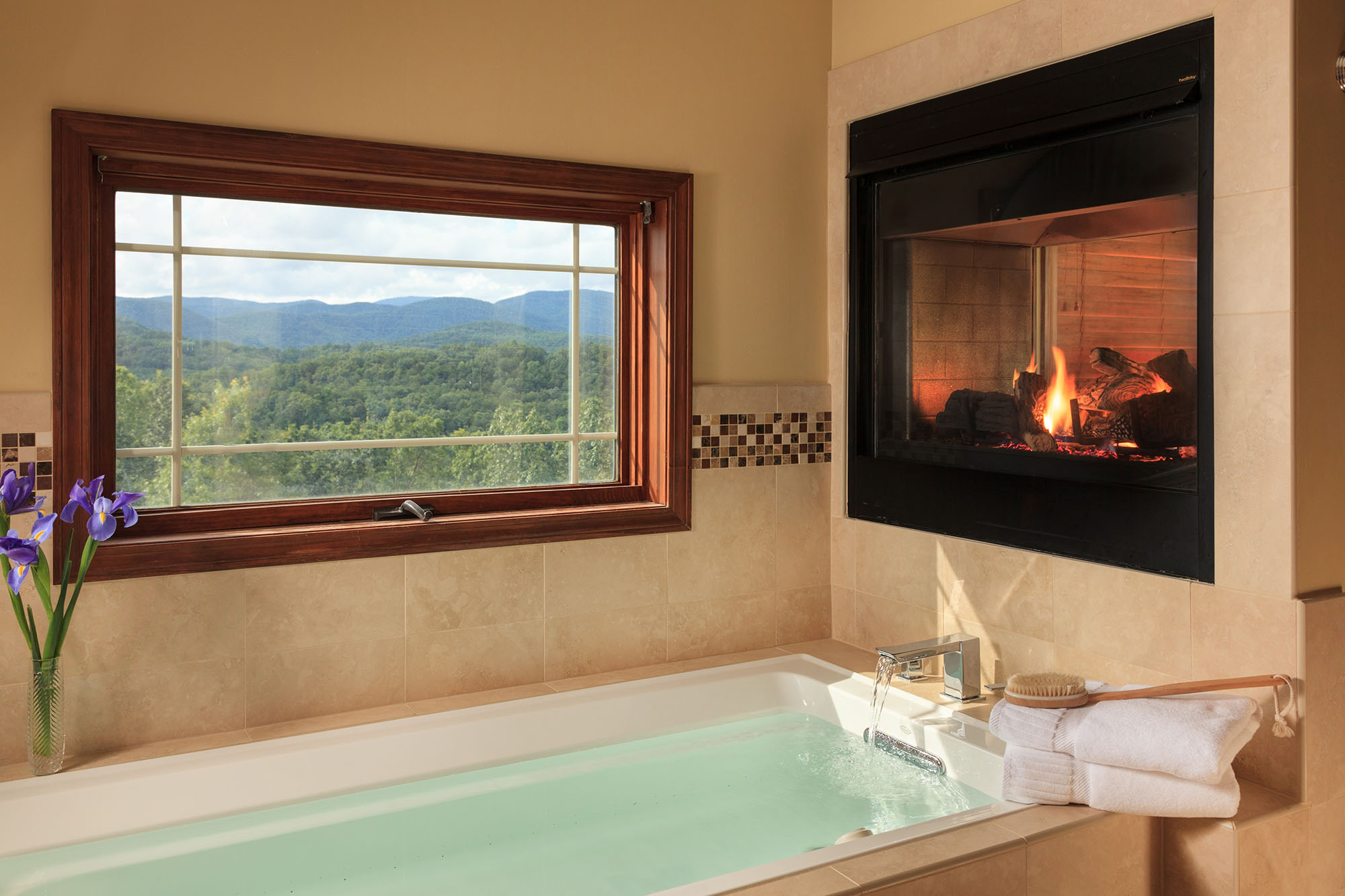 Relax in a tub overlooking the mountains at Lucille's Mountain Top Inn & Spa
