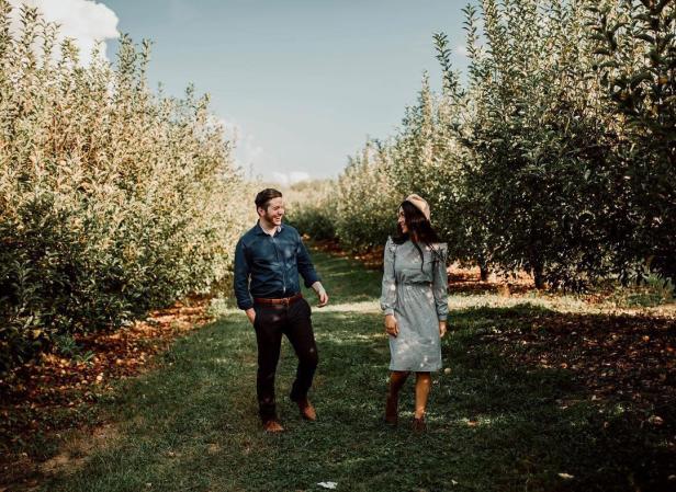 Couple walking in the orchard at B.J. Reece Orchards in Ellijay, Georgia. Photo by @steffyfortner