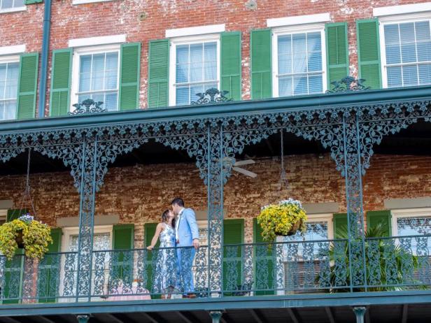 Couple on the porch of The Marshall House in Savannah, Georgia