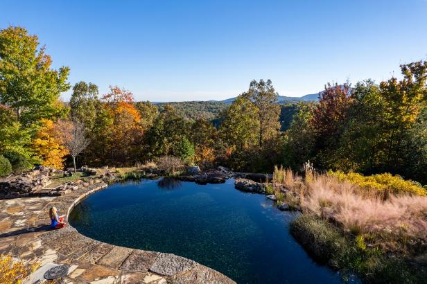 Woman sitting by a pond at Elohee in Sautee Nacoochee, Georgia