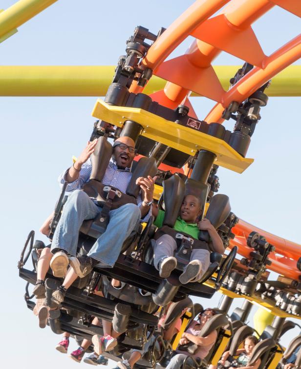 Father and son on the Swamp Thing coaster at Wild Adventures in Valdosta, Georgia