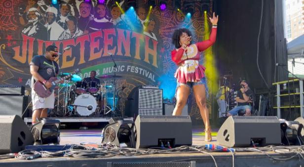 Performers on stage at Juneteenth Atlanta Parade & Music Festival