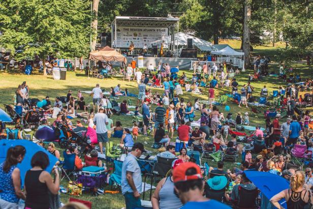 Fans on the lawn at the Grant Park Summer Shade Festival in Atlanta, Georgia