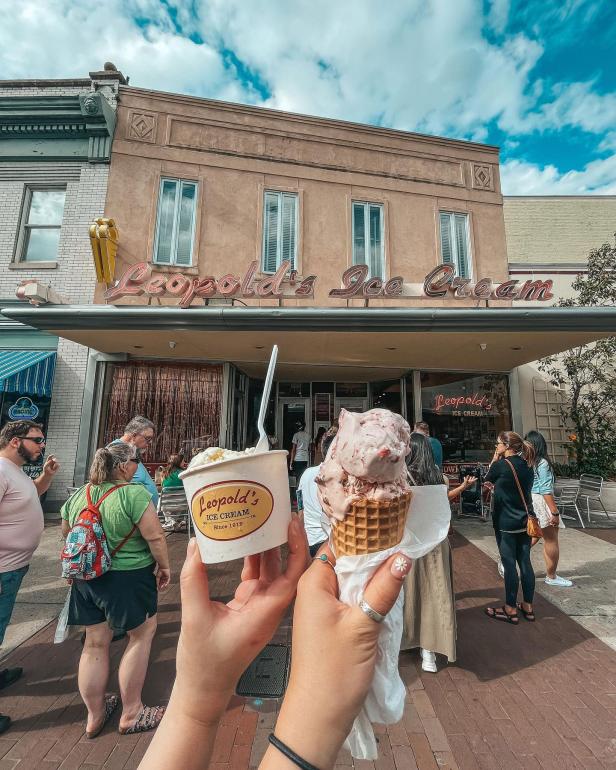 Two hands holding ice cream outside Leopold's in Savannah, Georgia